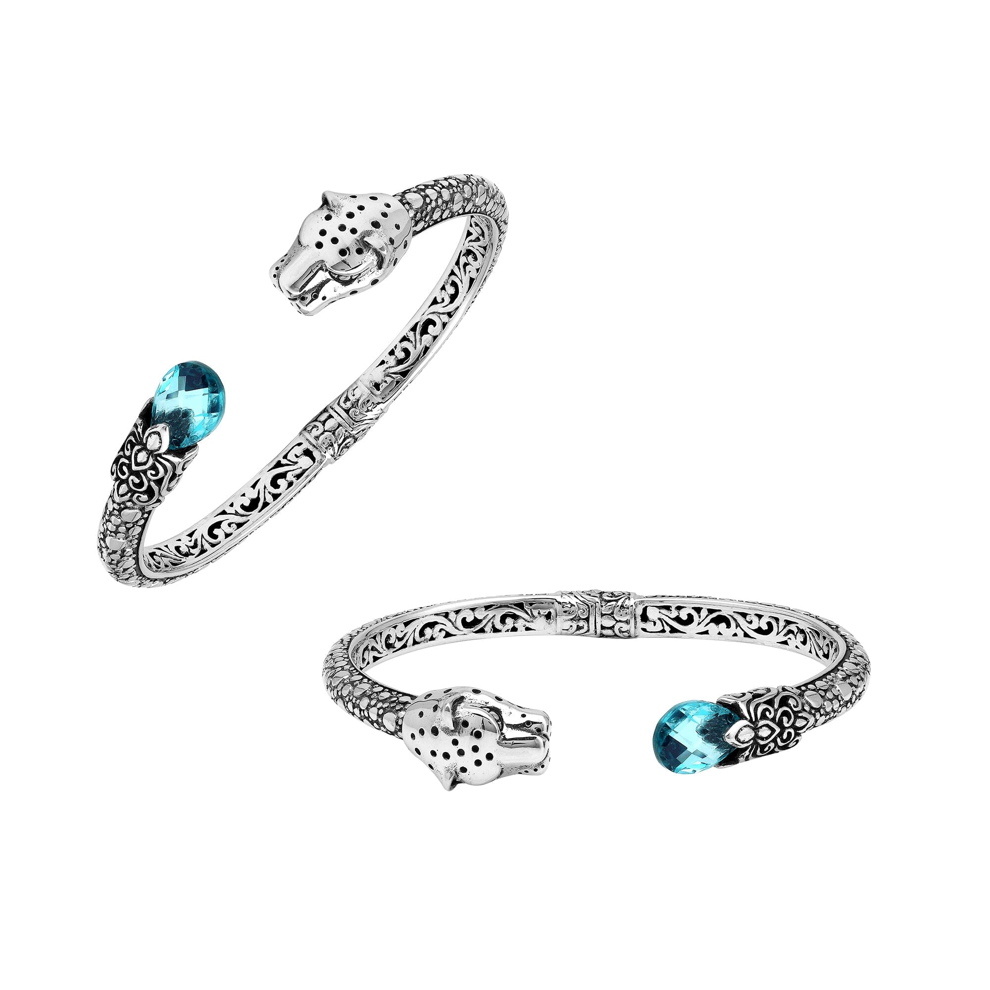 Sterling silver panther head cuff bangle with blue topaz quartz ends and floral carving handcrafted in Bali.