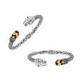 Sterling silver panther head cuff bangle with citrine quartz ends and floral carvings handcrafted in Bali.