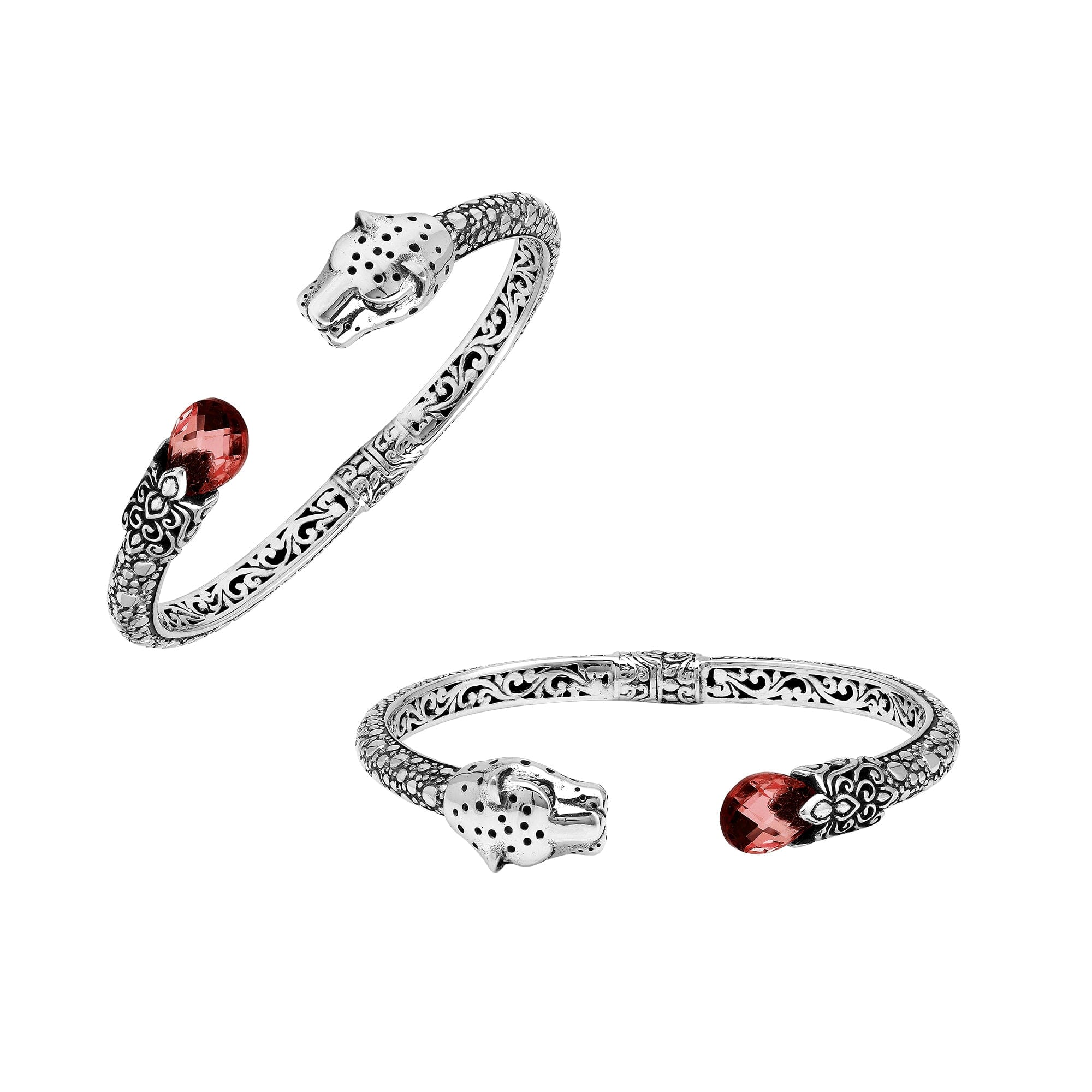 Sterling silver panther head cuff bangle with garnet quartz ends and intricate floral carvings handcrafted in Bali.