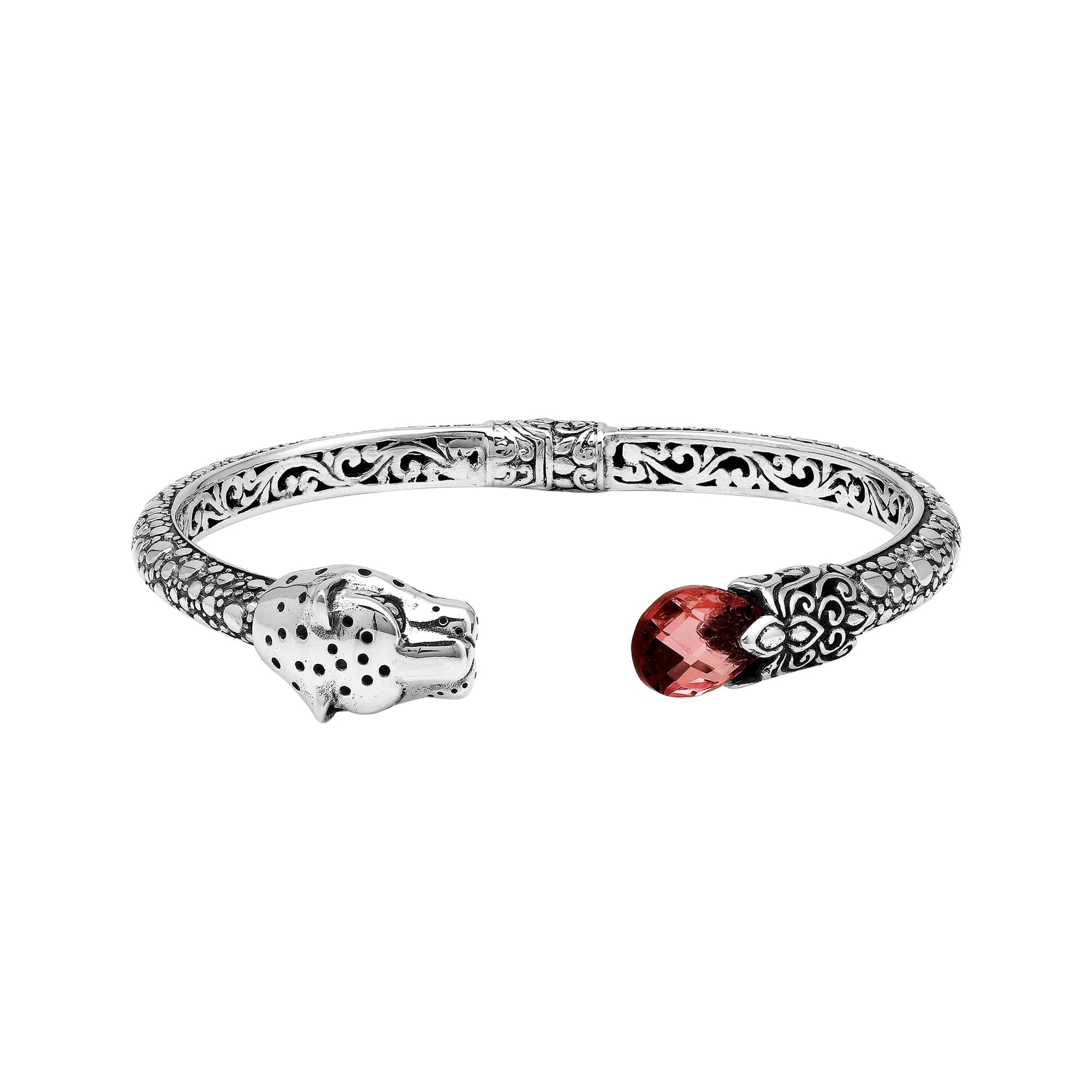 Sterling silver panther head cuff bangle with garnet quartz ends and intricate floral carvings handcrafted in Bali.
