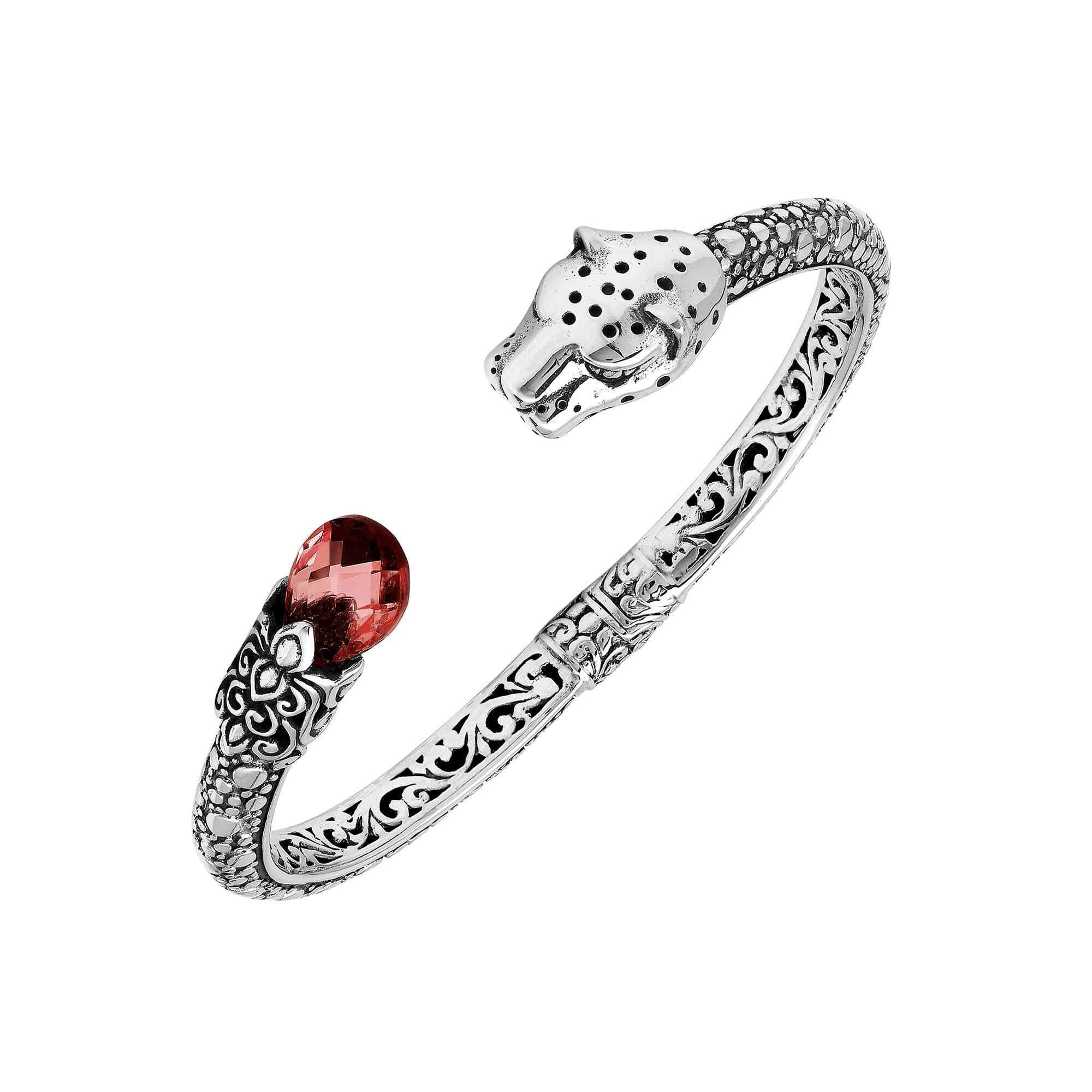 Sterling silver panther head cuff bangle with garnet quartz ends and intricate floral carvings handcrafted in Bali.