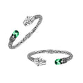 Sterling silver panther head cuff bangle with green quartz ends and floral detailing handcrafted in Bali.