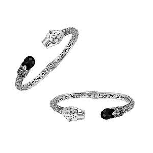 Sterling silver panther head cuff bangle with black onyx ends and floral detailing handcrafted in Bali.