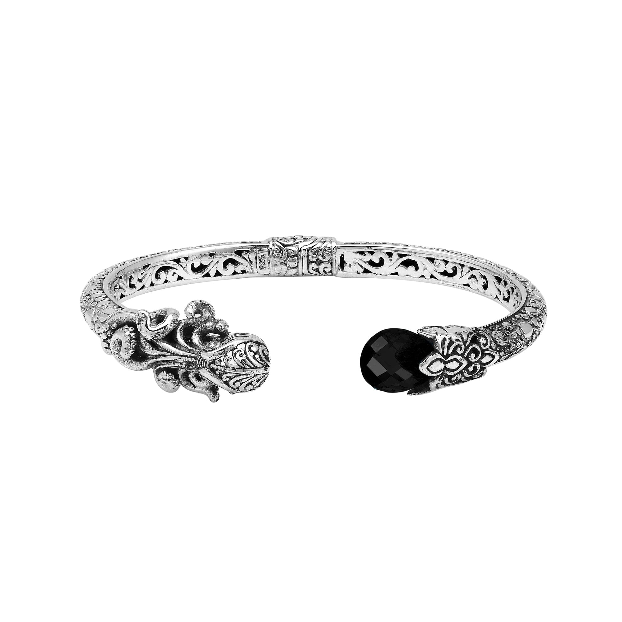 Sterling silver dragon head cuff bangle with black onyx ends and floral carvings handcrafted in Bali.
