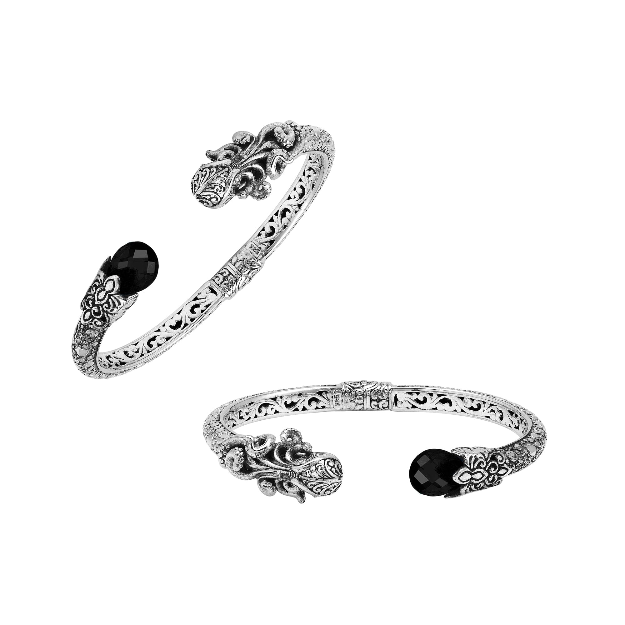 Sterling silver dragon head cuff bangle with black onyx ends and floral carvings handcrafted in Bali.