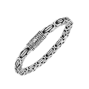 A wholesale sterling silver chain bracelet featuring thick Balinese links, oxidized detailing, polished finishing, and a secure push clasp suitable for premium bulk jewelry purchasing.