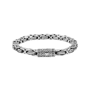 A wholesale sterling silver chain bracelet featuring thick Balinese links, oxidized detailing, polished finishing, and a secure push clasp suitable for premium bulk jewelry purchasing.