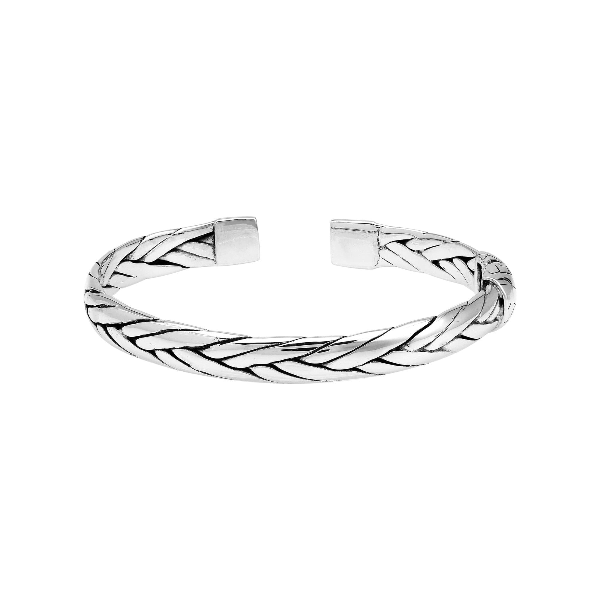 A wholesale sterling silver small woven bangle featuring polished Balinese textures, smooth finishing, and a secure hinge lock perfect for lightweight premium jewelry collections.