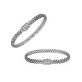 A wholesale sterling silver slim woven bracelet featuring a CVD Diamond-studded push clasp with polished and oxidized detailing, crafted for premium bulk jewelry collections demanding refined shine and durability.