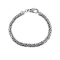 Wholesale sterling silver bracelet featuring a 3MM x 5MM Balinese woven chain with polished and oxidized detailing, finished with a secure lobster lock for catalog presentation.