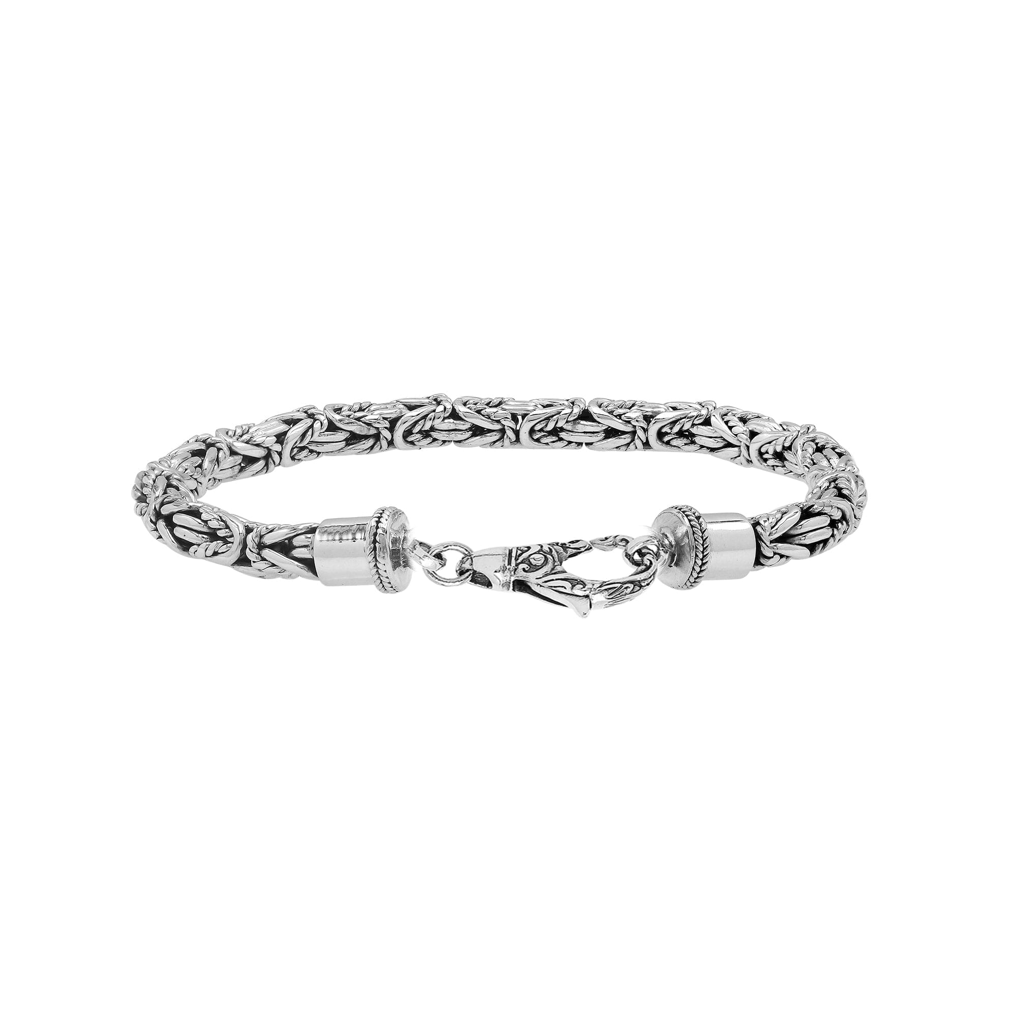 Wholesale sterling silver bracelet featuring Balinese woven wheat-link design with detailed lobster clasp handcrafted in Bali.