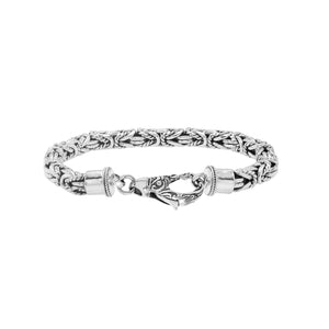 Wholesale sterling silver bracelet with Balinese woven wheat-link design and decorative lobster clasp handcrafted in Bali.