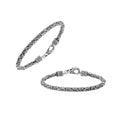 Sterling silver braided wheat chain bracelet with oxidized finish and ornate hook clasp handcrafted in Bali.