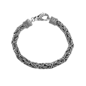 Wholesale sterling silver bracelet featuring a handcrafted 6MM Balinese woven chain with oxidized highlights and a secure lobster lock suitable for catalog and bulk listings.