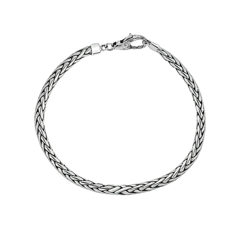 Sterling silver braided chain bracelet with polished finish and lobster clasp