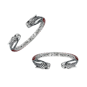 Wholesale sterling silver phoenix-inspired bangle featuring Red Coral accents, ornate Balinese scroll engraving, and a sturdy hinge lock for detailed, artisan-quality wholesale jewelry collections.