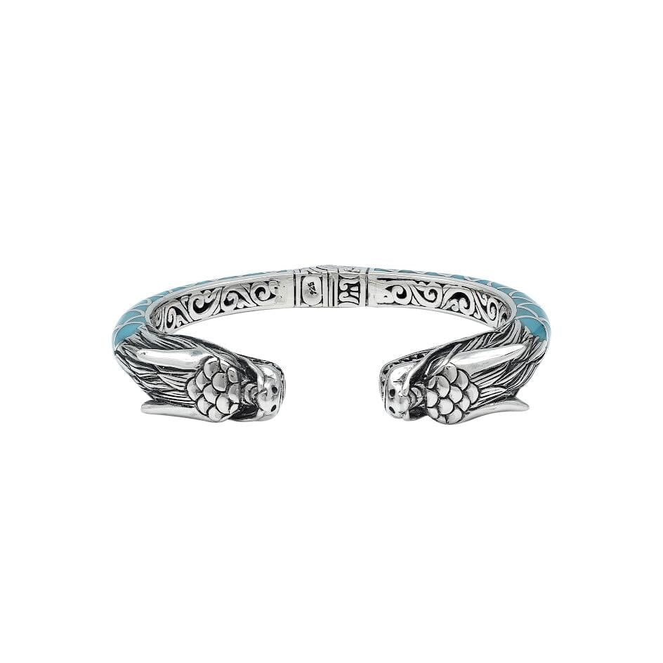 Wholesale sterling silver phoenix bangle featuring Turquoise Shell accents, ornate Balinese scroll engravings, and a secure hinge lock crafted for premium artisan wholesale jewelry collections.