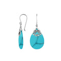 Sterling silver turquoise shell teardrop earrings with scroll accent design for wholesale jewelry buyers