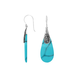 Turquoise Shell teardrop silver earrings with swirl pattern