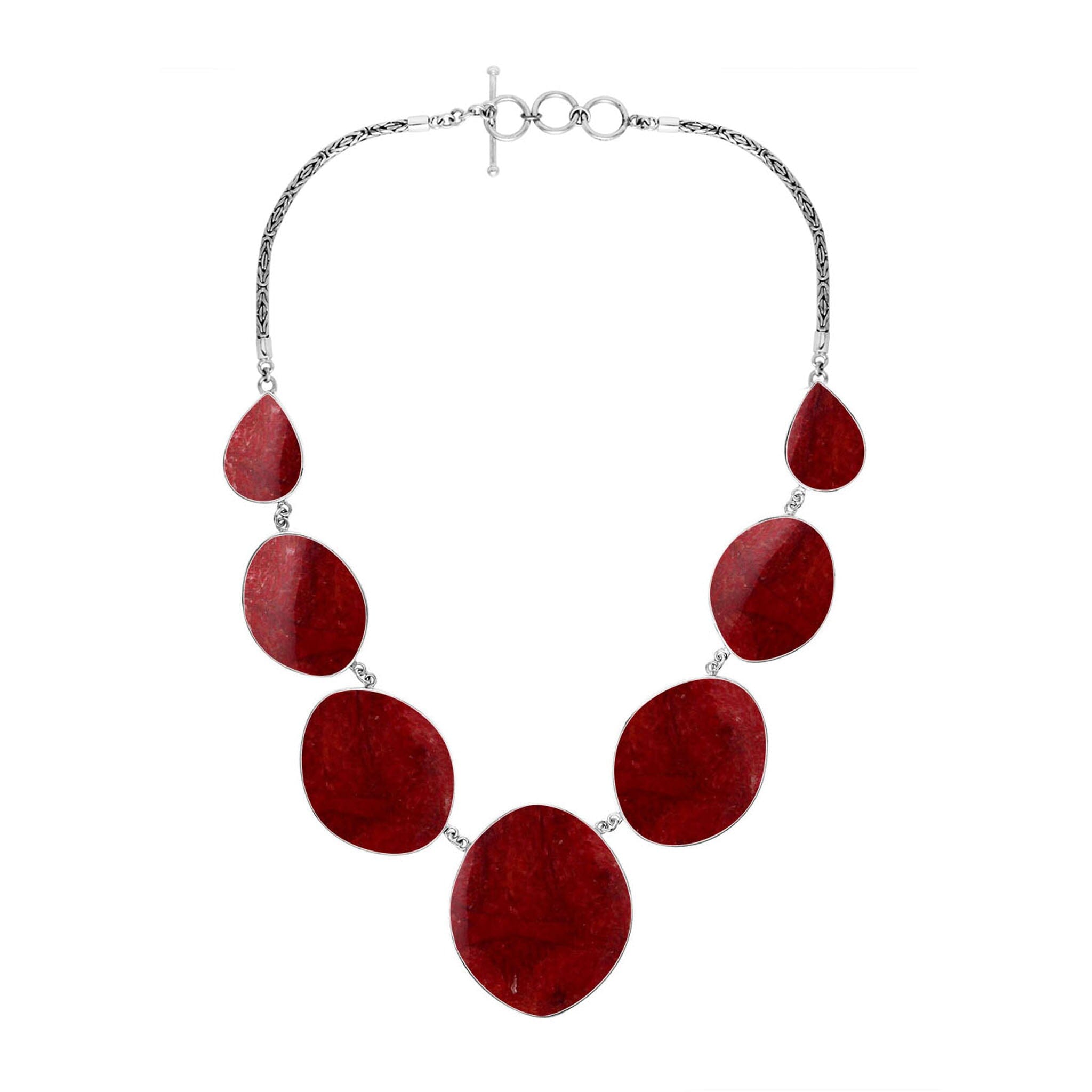 Wholesale sterling silver oval coral necklace with Balinese handcrafted design.