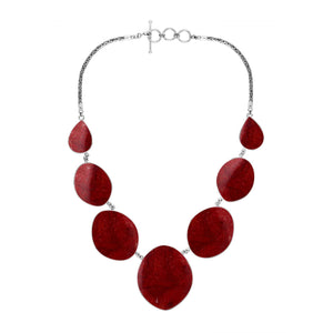 Wholesale sterling silver oval coral necklace with Balinese handcrafted design.