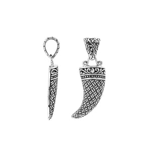 Sterling silver tribal tooth pendant with intricate Balinese engravings, handcrafted men’s jewelry from Bali – wholesale supplier.