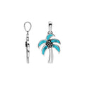 Sterling silver palm tree pendant with turquoise inlay, handmade in Bali for wholesale jewelry buyers.