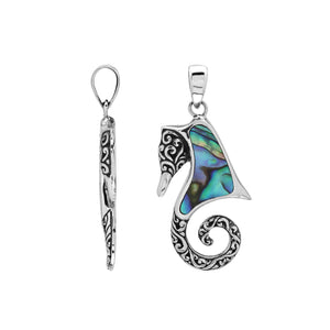 Sterling silver seahorse pendant with abalone shell inlay and Balinese scroll detailing, handmade in Bali for wholesale buyers.