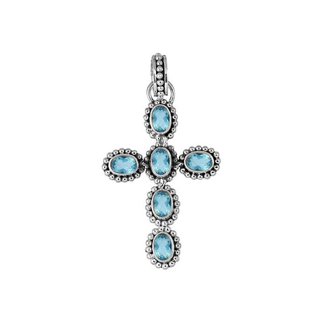 Sterling silver cross pendant with oval faceted blue topaz quartz and beaded detailing, handcrafted in Bali