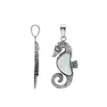Sterling silver seahorse pendant featuring a luminous Mother Of Pearl inlay and intricate Balinese craftsmanship with a polished high-gloss finish.