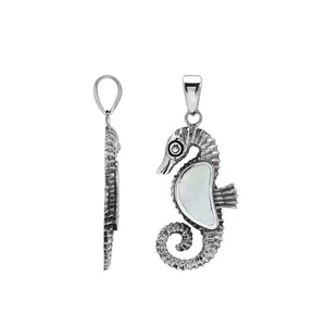 Sterling silver seahorse pendant featuring a luminous Mother Of Pearl inlay and intricate Balinese craftsmanship with a polished high-gloss finish.