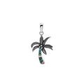 Sterling silver palm tree pendant with abalone shell inlay and Balinese-inspired detailing featuring a polished finish.
