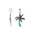 Sterling silver palm tree pendant with turquoise shell inlay and traditional Balinese craftsmanship featuring a polished finish.