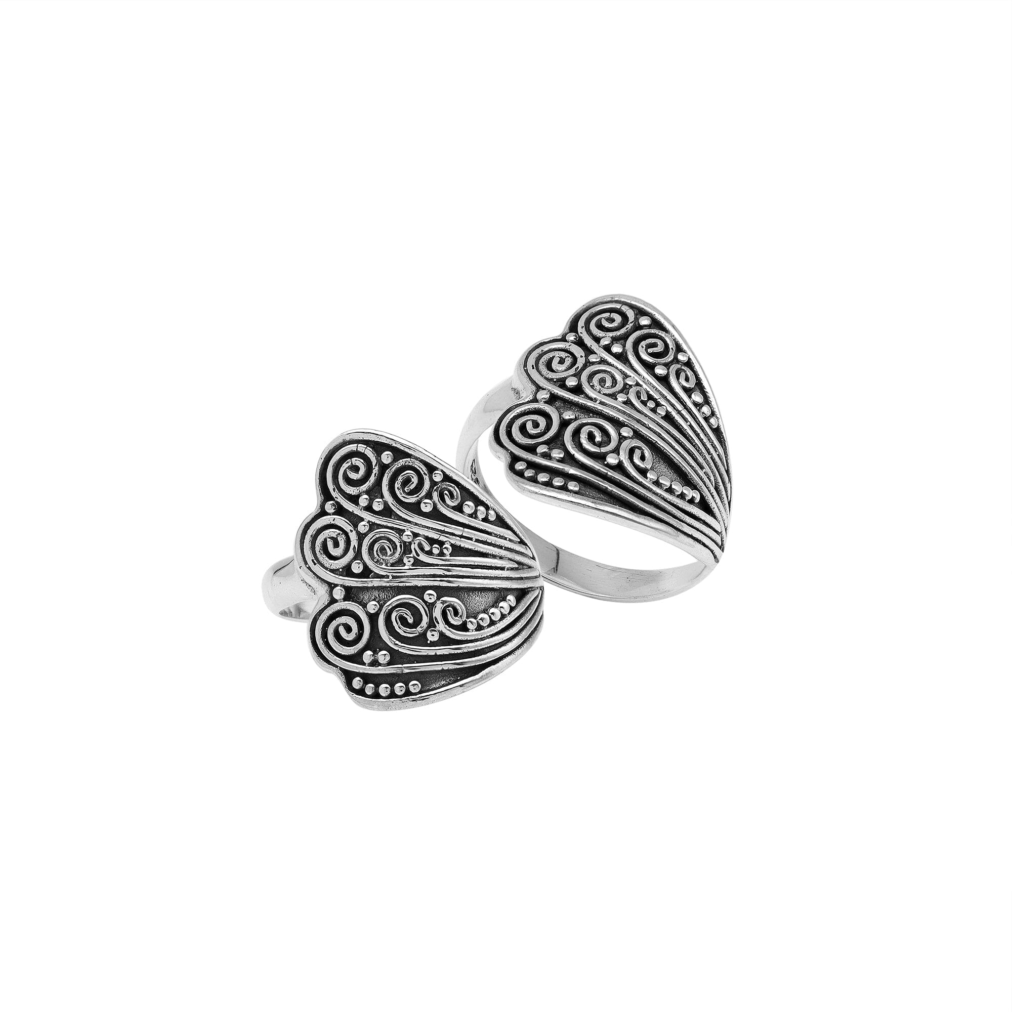 Wholesale sterling silver adjustable ring with dual Balinese swirl and dot panels, handcrafted in Bali, artisan bulk jewelry design.