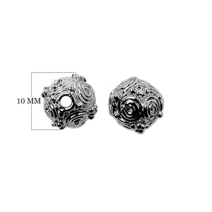 Black rhodium overlay over copper handcrafted textured spherical bead with spiral detailing for wholesale jewelry making