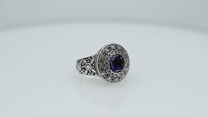 Wholesale sterling silver ring with round Amethyst Quartz and engraved Balinese bezel.