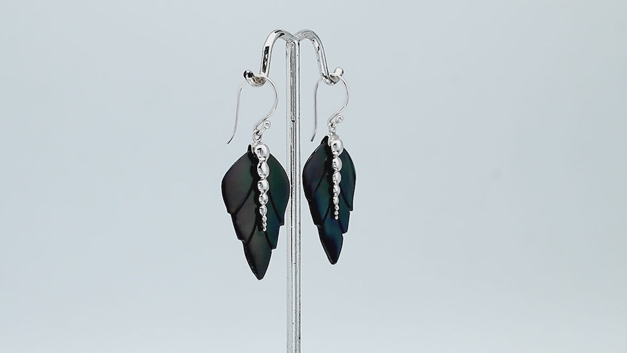 Sterling silver black shell carved leaf drop earrings with polished silver bead detailing and handcrafted dark shell design.