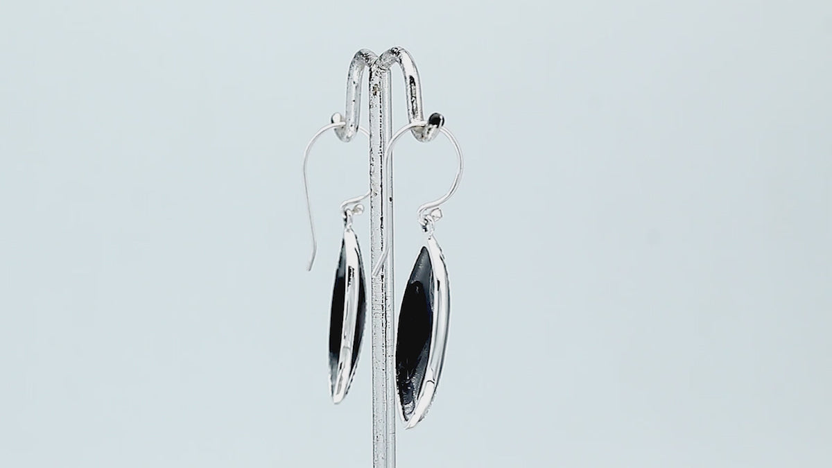 925 Sterling Silver Black Shell marquise drop earrings featuring glossy dark shell inlays, double infinity-inspired openwork motifs, oxidized dotted detailing, polished silver borders, and curved fishhook ear wires.