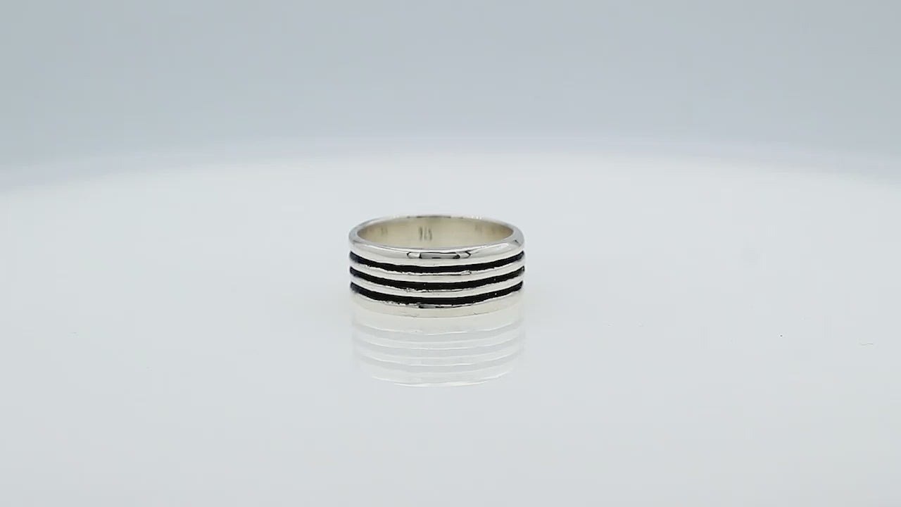 Wholesale sterling silver band ring with three oxidized black stripes, wide unisex design, handcrafted 925 silver jewelry for bulk orders and resellers.