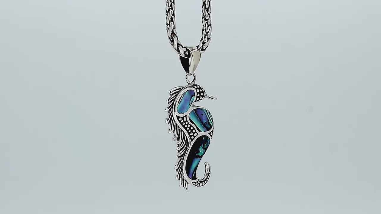 Wholesale sterling silver seahorse pendant with genuine abalone shell inlay, handcrafted in Bali – ocean-inspired artisan jewelry for bulk buyers.