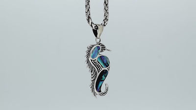 Wholesale sterling silver seahorse pendant with genuine abalone shell inlay, handcrafted in Bali – ocean-inspired artisan jewelry for bulk buyers.