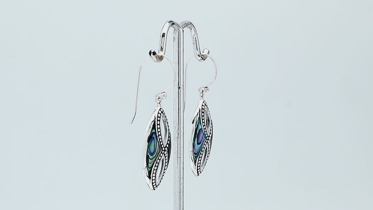 925 Sterling Silver Mother Of Pearl marquise drop earrings featuring luminous white shell inlays, double infinity-inspired openwork, oxidized dotted detailing, polished silver borders, and elegant fishhook ear wires.