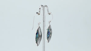 925 Sterling Silver Mother Of Pearl marquise drop earrings featuring luminous white shell inlays, double infinity-inspired openwork, oxidized dotted detailing, polished silver borders, and elegant fishhook ear wires.