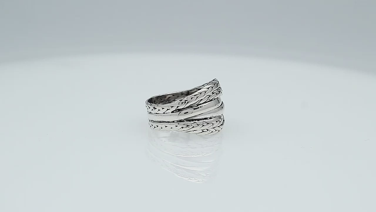 Wholesale sterling silver braided dome ring with rope pattern and polished silver bands, handcrafted artisan jewelry from Bali.