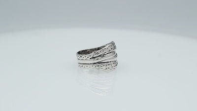 Wholesale sterling silver braided dome ring with rope pattern and polished silver bands, handcrafted artisan jewelry from Bali.