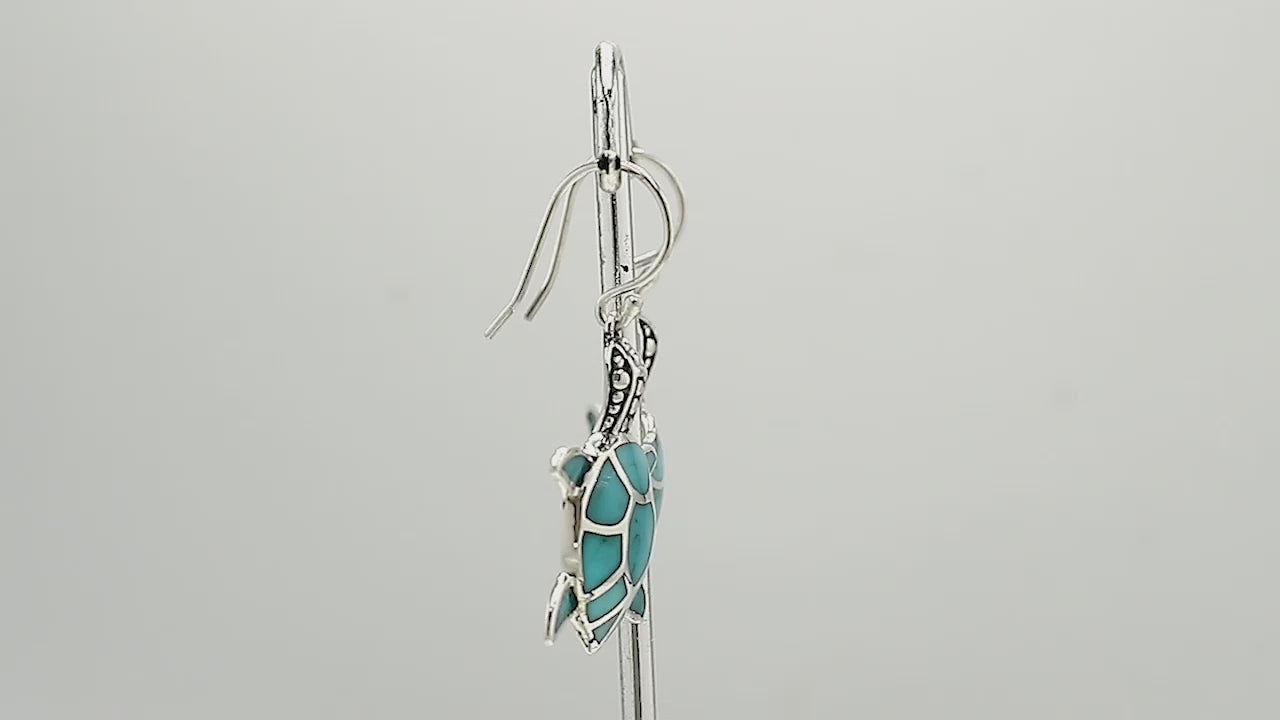 Sterling silver turtle earrings with turquoise shell, handcrafted for wholesale ocean-inspired jewelry collections