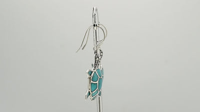 Sterling silver turtle earrings with turquoise shell, handcrafted for wholesale ocean-inspired jewelry collections