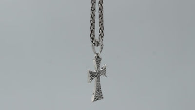 Wholesale sterling silver cross pendant with textured patterns and oxidized finish, handcrafted Bali artisan jewelry for bulk buyers.