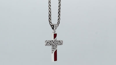Sterling silver ornate cross pendant with red coral inlay and oxidized scroll detailing