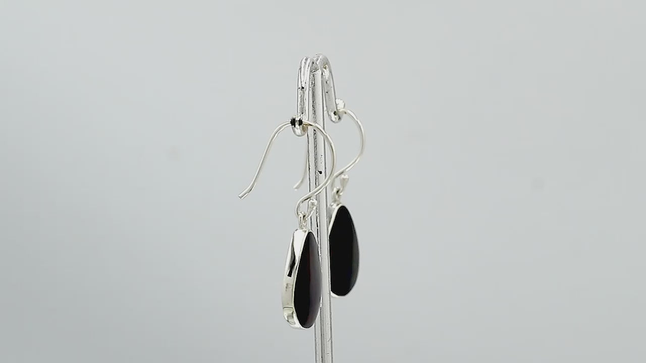 Wholesale Sterling Silver Black Shell pear drop earrings with sleek polished setting and earwire lock handcrafted in Bali.